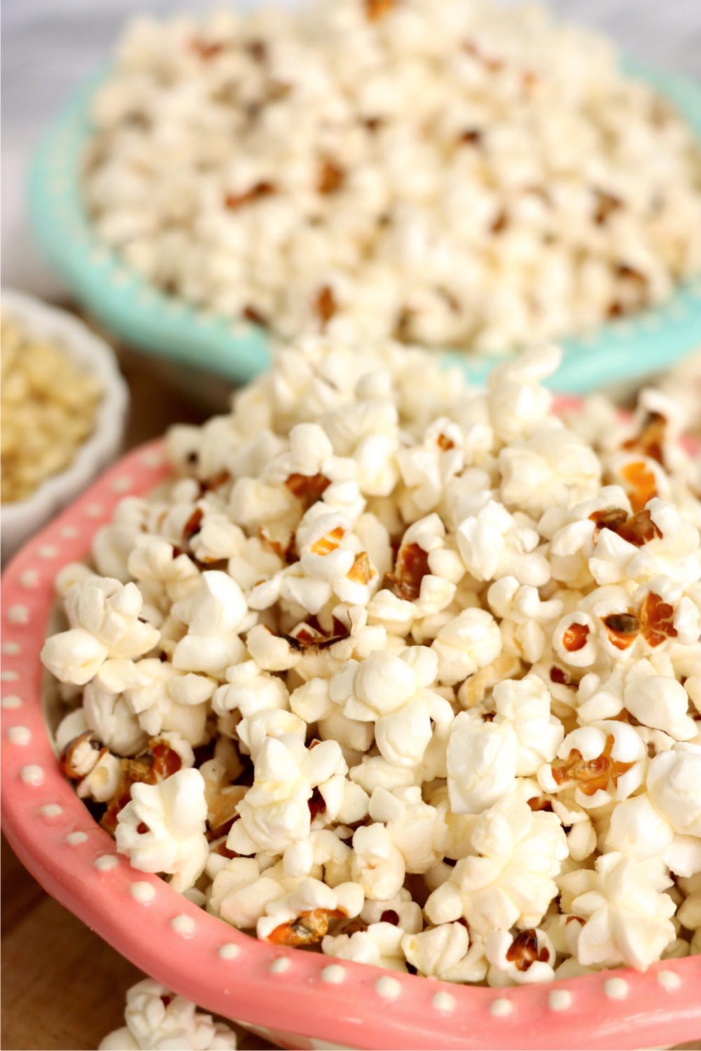 close up of a heaping bowl of popcorn