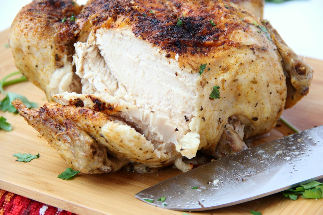 Ninja Foodi Roast Chicken - Deliciously moist chicken that's flavorful and crispy on the outside! So easy to make in your Ninja Foodi in no time at all!