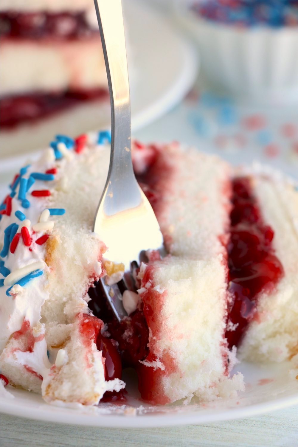 fork digging into cherry torte