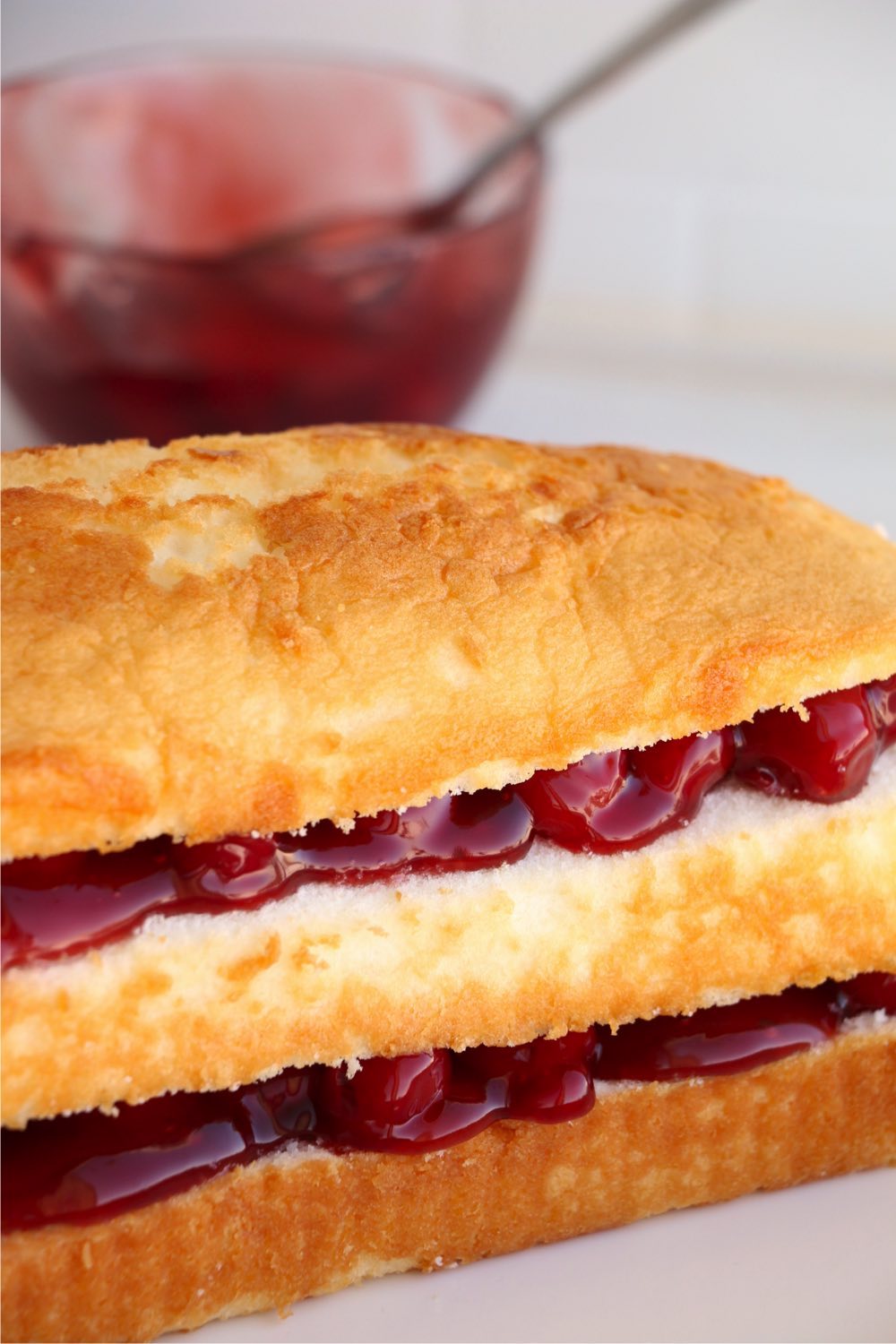 Pound cake with cherry pie filling layers
