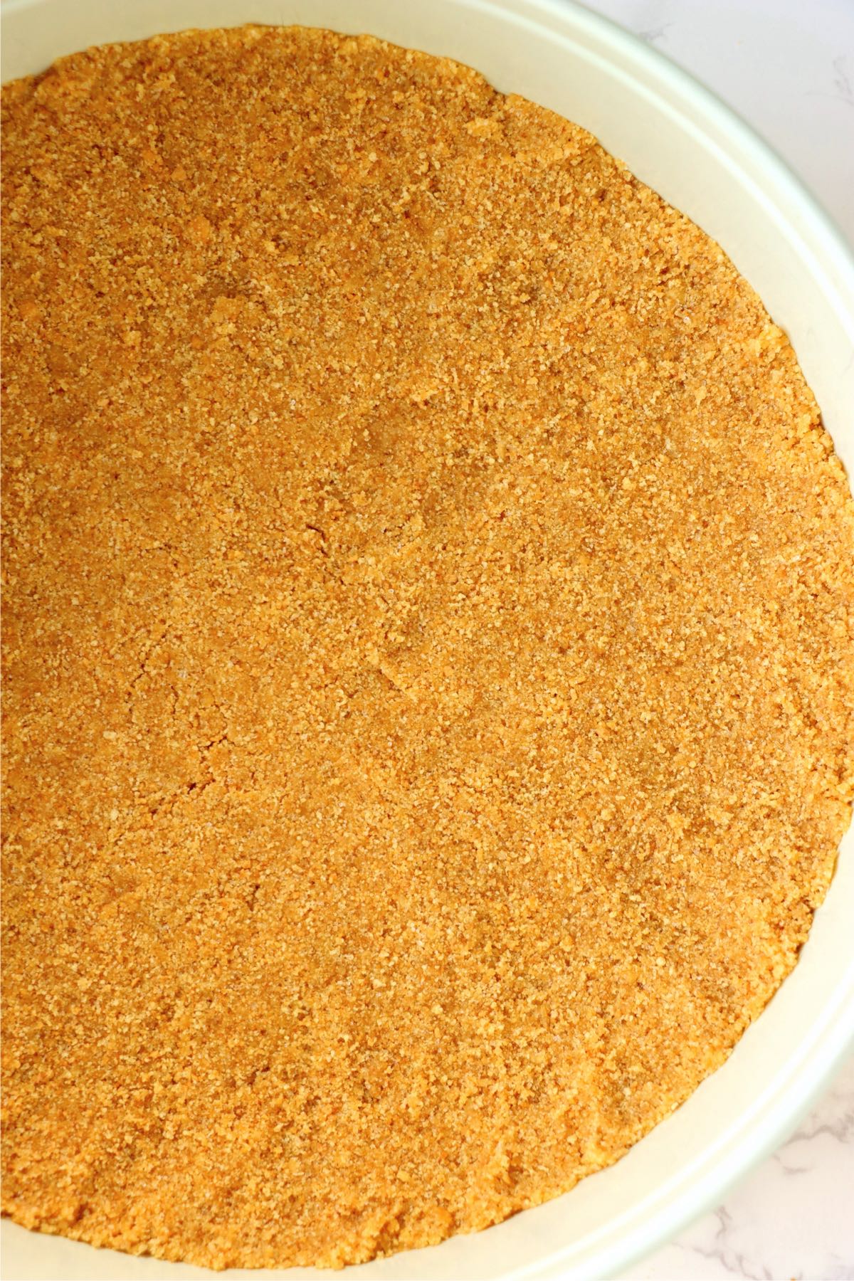 Graham cracker crust in a pie pan