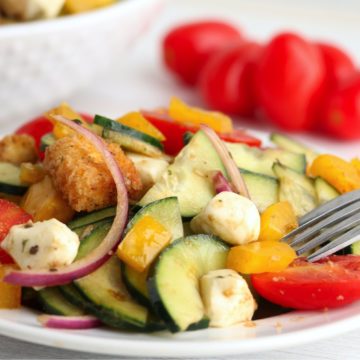 bright colorful salad on a white plate