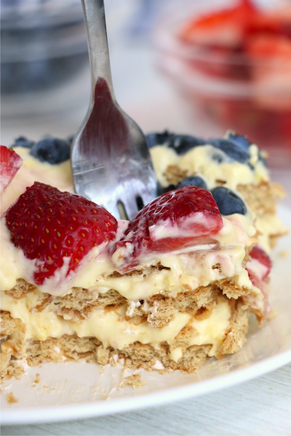 fork going into piece of icebox cake