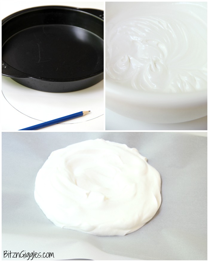 Triple Berry Pavlova - This meringue cake is crisp on the outside and soft and light on the inside! Topped with homemade whipped cream and fresh berries, it's such an elegant, light and delicious dessert!