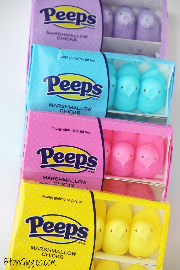 Peeps Cake With Marshmallow Frosting - This cake incorporates bits of Peeps right into the baking process, producing a colorful and slightly sweetened cake with a fluffy, marshmallow frosting that literally melts in your mouth!