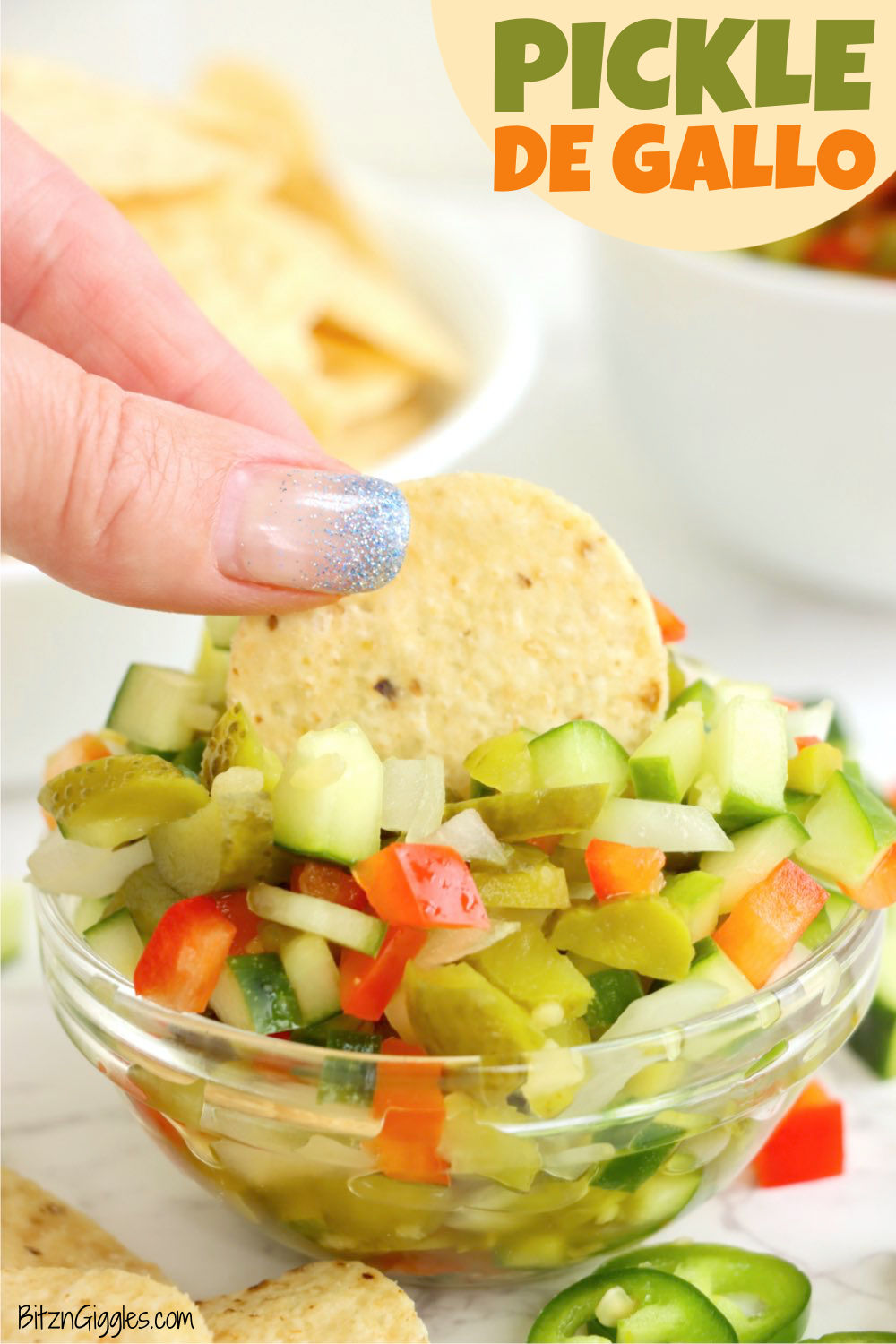 chip being dipped in pickle relish