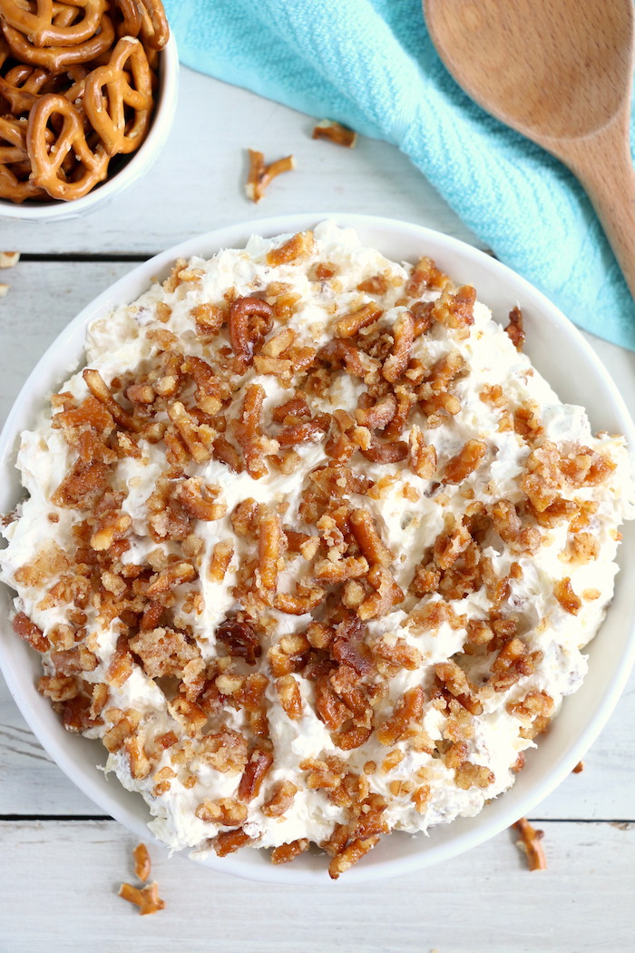 Pineapple Pretzel Salad - This cool, creamy pineapple fluff filled with candied pretzels is the perfect combination of sweet and salty, and can be served as a dessert or sweet side dish!Â