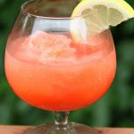 Pink Flamingo Vodka Slush - A refreshing and flavorful slushy drink perfect for parties and BBQs!