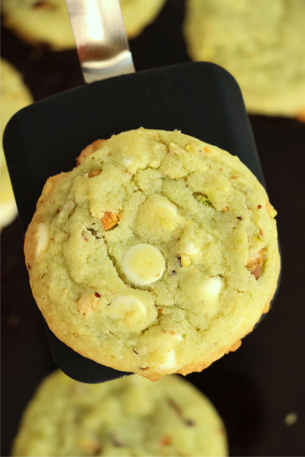 big pistachio pudding cookie on spatula