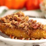 side view of a piece of pumpkin pie