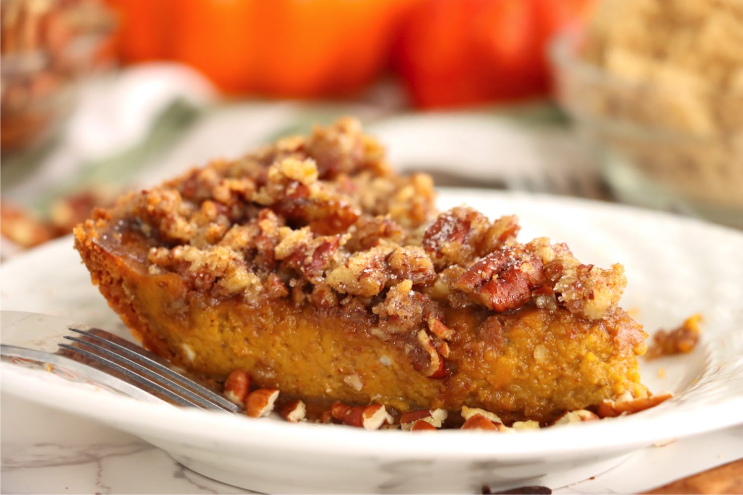 side view of a piece of pumpkin pie