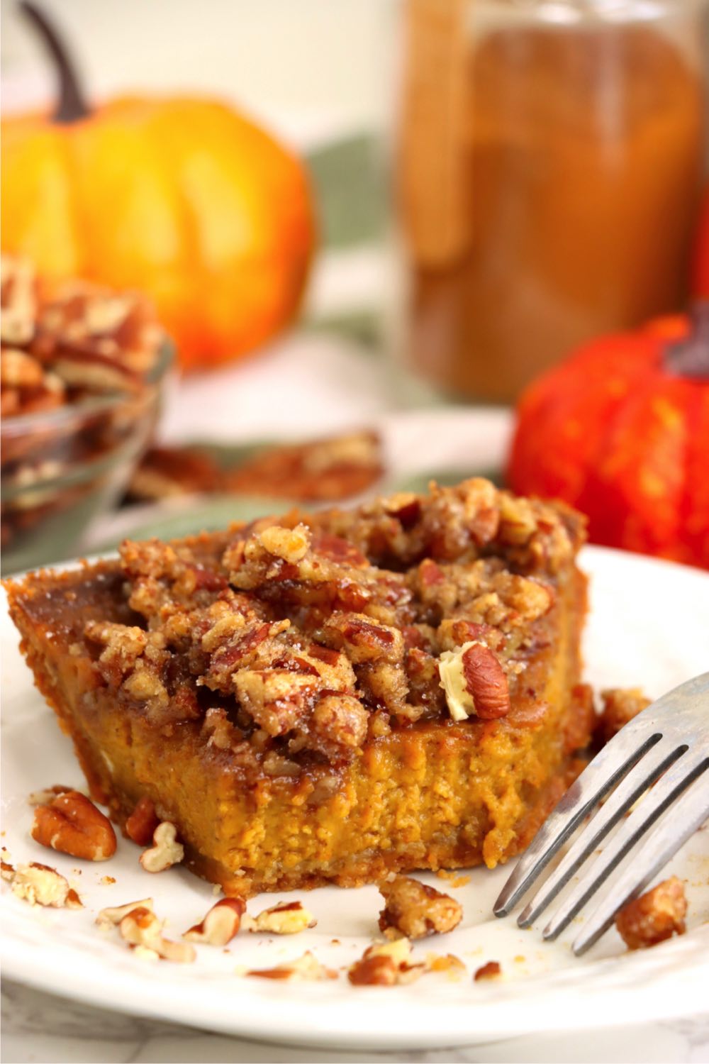 half eaten piece of praline pumpkin pie