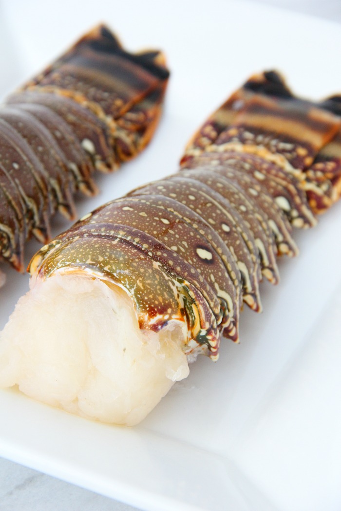 lobster tail on cutting board