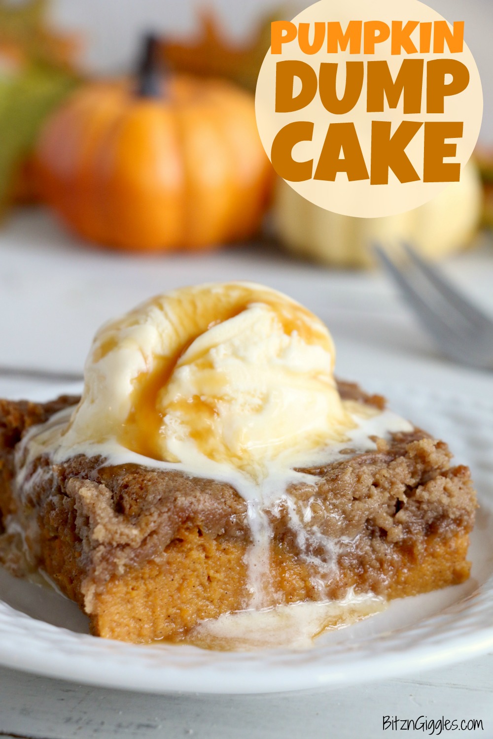 Pumpkin Dump Cake - An easy and delicious pumpkin spice cake topped with vanilla ice cream and caramel drizzle!