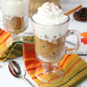 Pumpkin Mug Cake - A quick and easy microwave pumpkin mug cake. Topped with whipped cream and a cinnamon stick, this is the ultimate simple fall dessert!