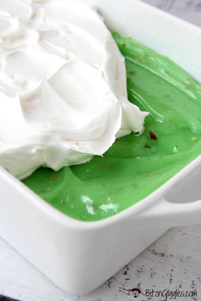 Pistachio Pie Bars - Creamy, four-layer bars with a pie-like crust topped with cheesecake and pistachio deliciousness!