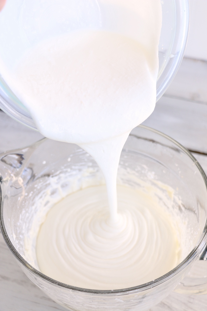 Making fruit dip in glass bowl