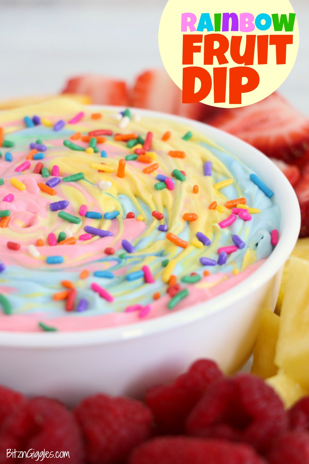 Bowl of rainbow fruit dip with sprinkles