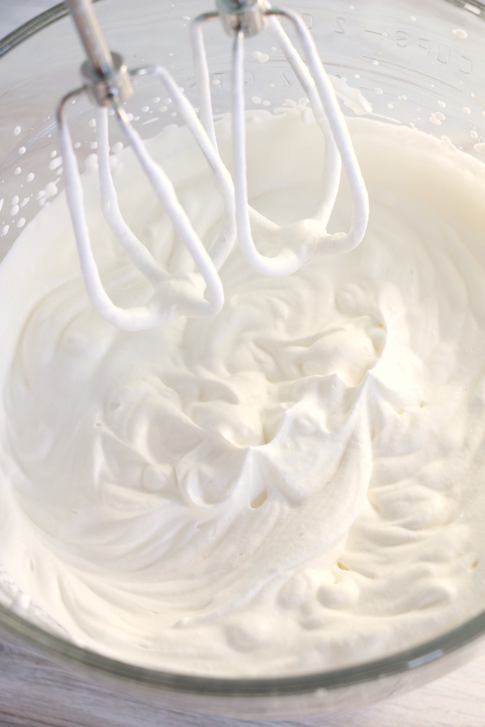 whipping heavy whipping cream with hand mixer