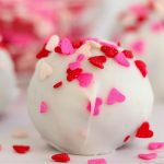 close up of a red velvet bourbon cake ball