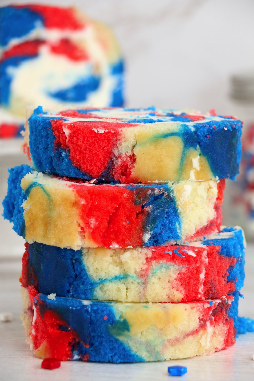 stack of red white and blue cake roll slices