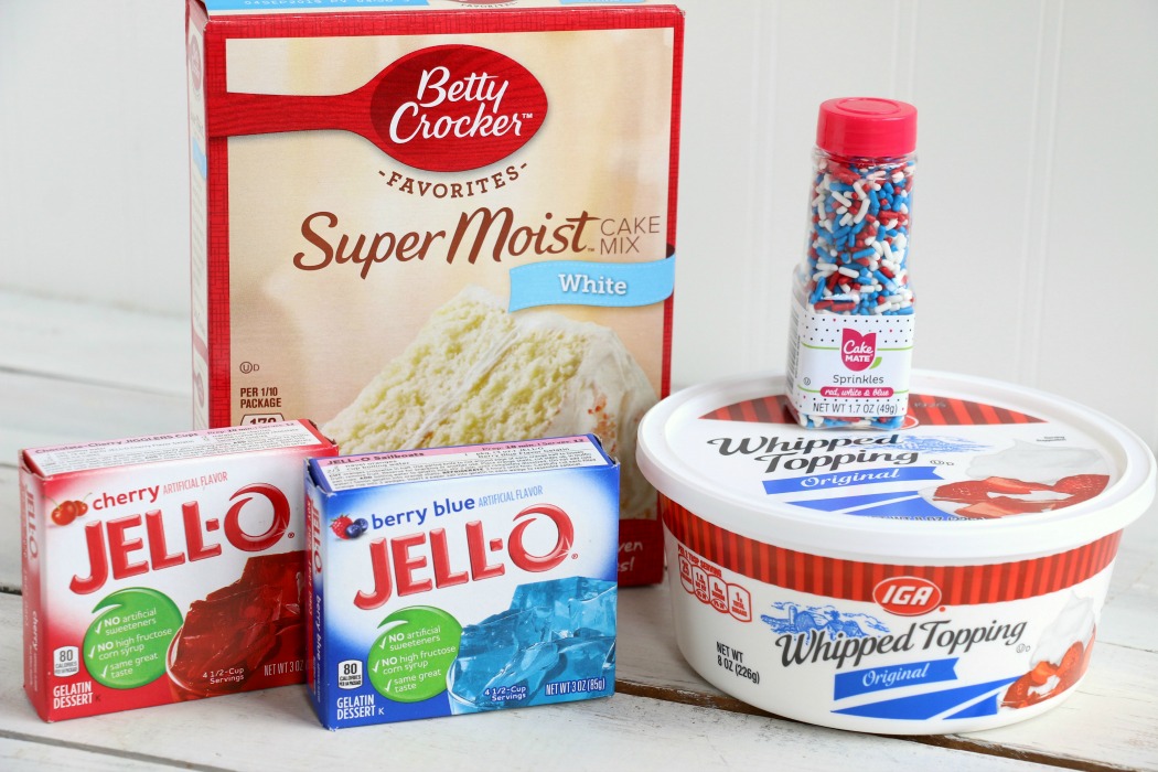 Red White and Blue Jello Poke Cake - A colorful and delicious cake, perfect for Memorial Day, the 4th of July or any patriotic celebration! The Jello is what makes it super moist!