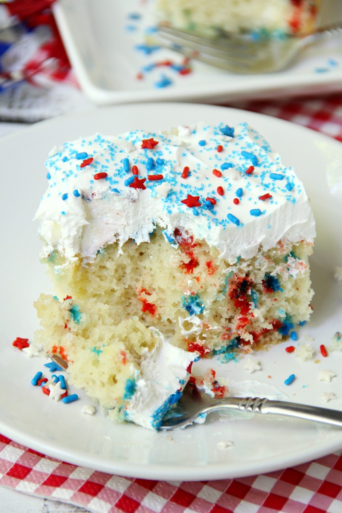 Red White & Blue Funfetti Cake - A simple DIY funfetti cake made with a box cake mix and sprinkles! So easy and perfect Memorial Day and 4th of July!