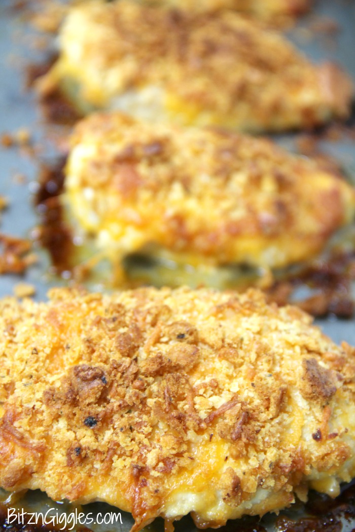 Ritz Cracker Chicken - Cheesy chicken covered with crispy, baked Ritz Crackers and topped with a creamy, flavorful sauce!