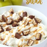 Snickers Caramel Apple Salad - a creamy, dreamy salad made with Snickers candy bars, pudding and whipped topping!