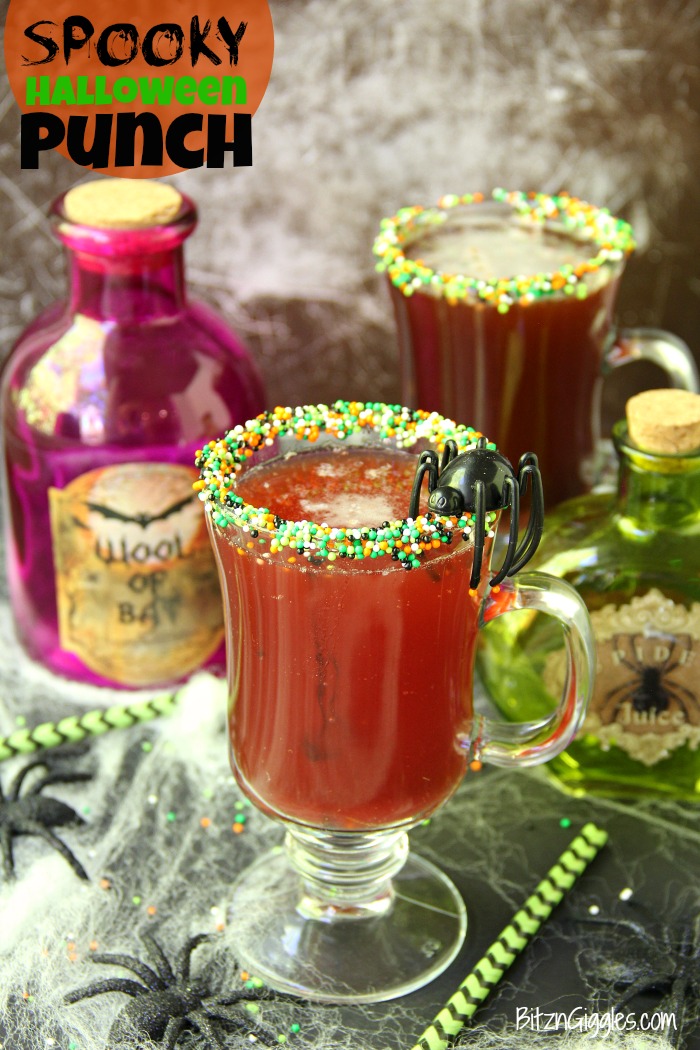 Spooky Halloween Punch - This Halloween punch is only three ingredients! When serving in a nonpareil-rimmed glass, the color of the candy starts dripping eerily into the punch, creating fun black streaks and darkening the color of the drink!