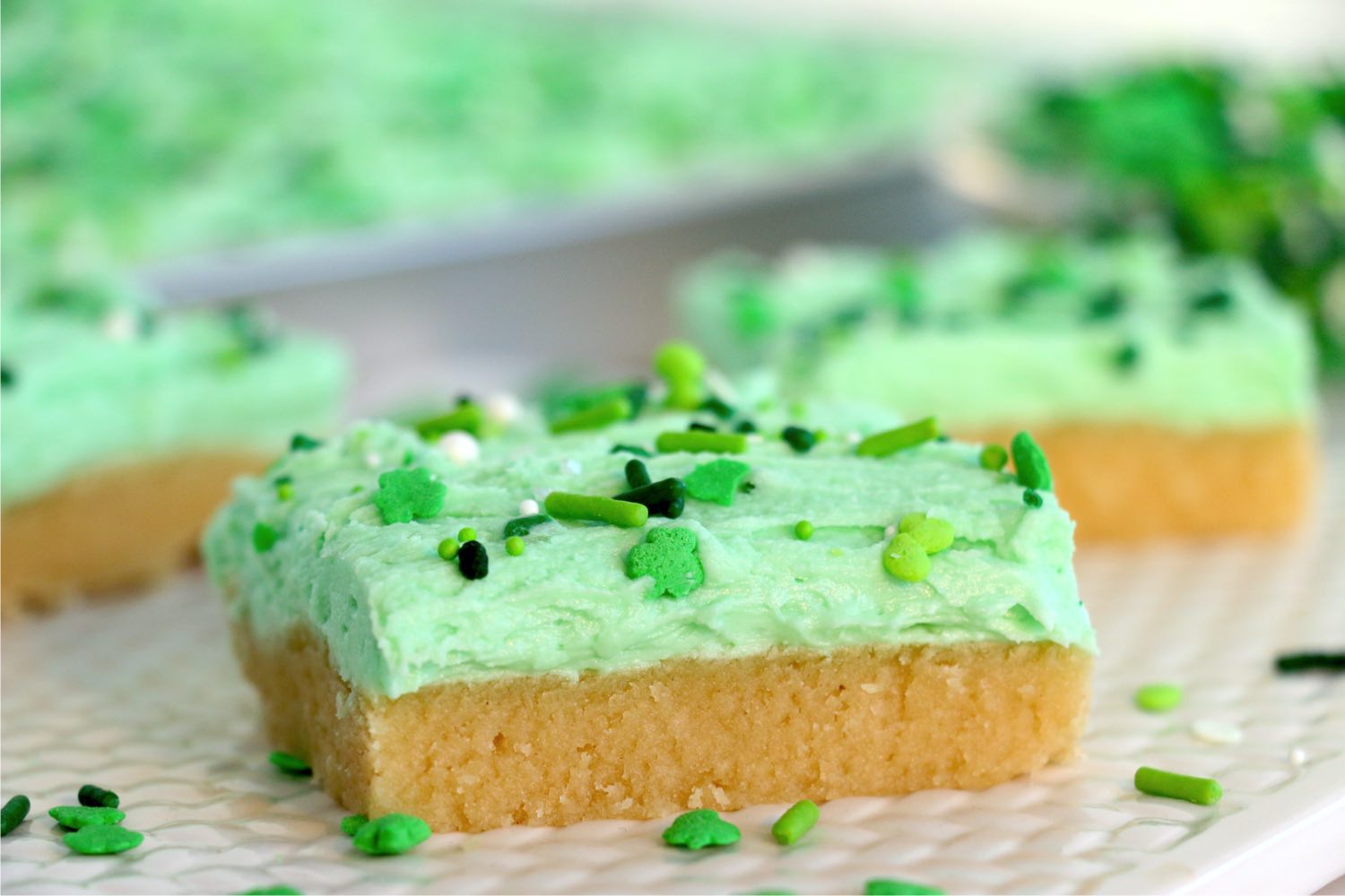 sugar cookie bars with green sprinkles