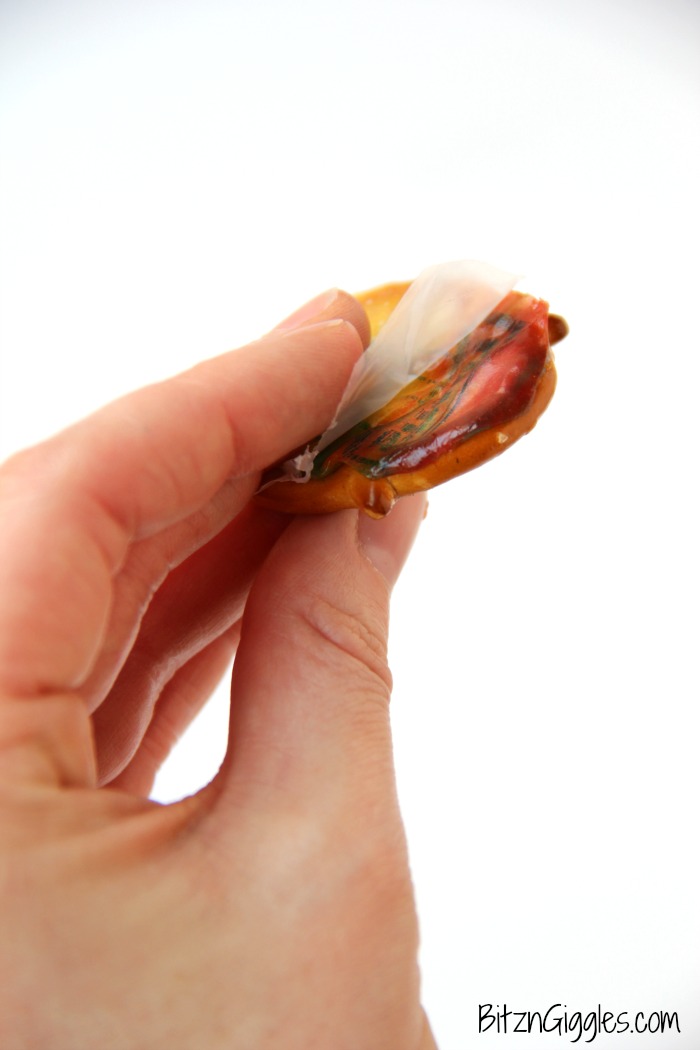 These Pretzel Butterflies are only four ingredients and so much fun to snack on! Fruit Roll-Ups bring color to the wings and give a gorgeous stained glass effect. So pretty when held up to the sun!