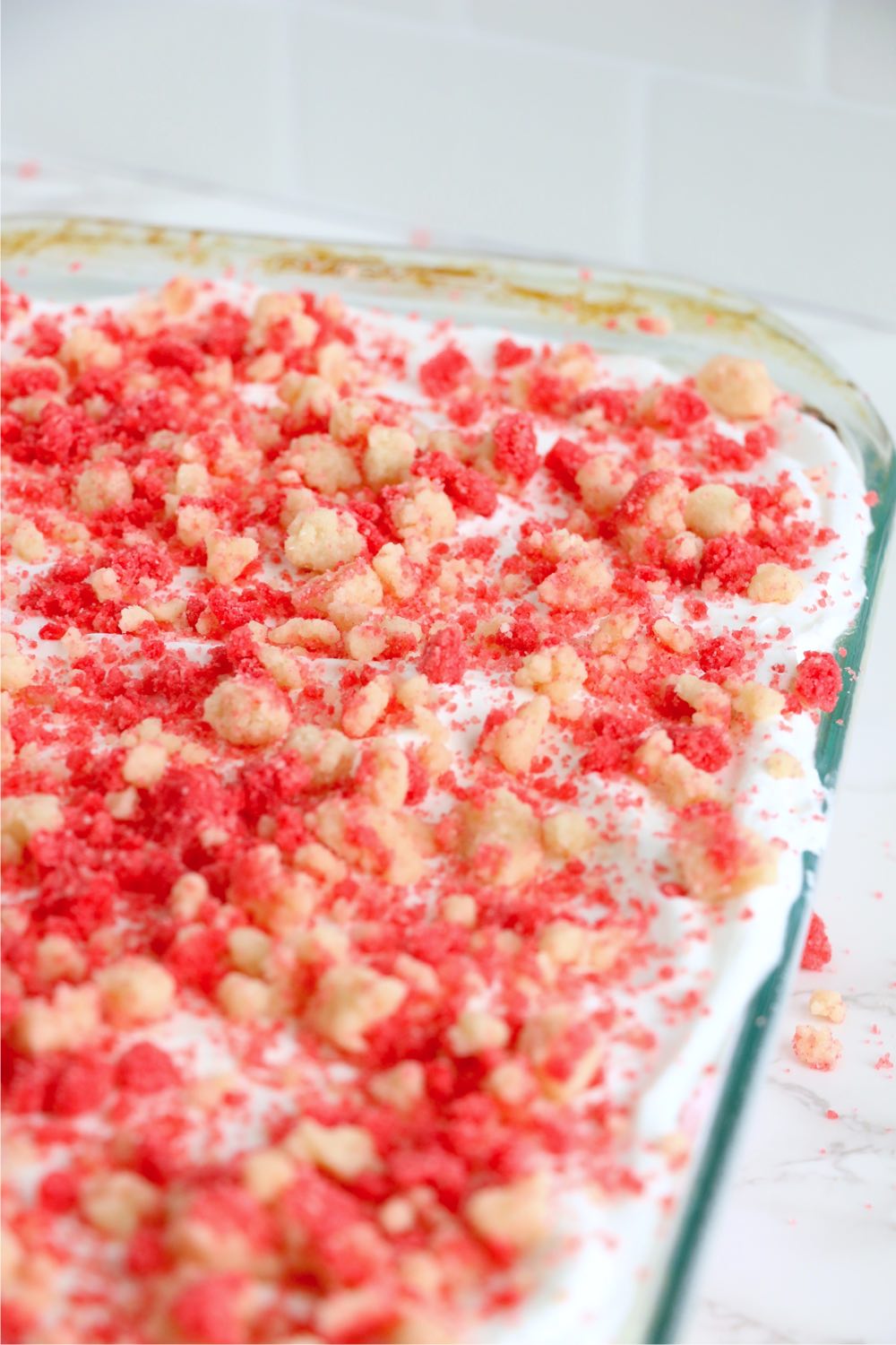 ice cream crumble cake in glass pan