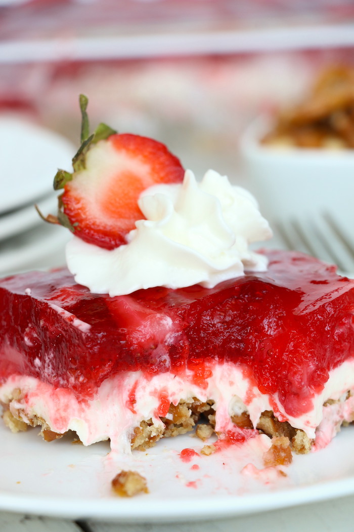 Strawberry Pretzel Dessert - This classic, potluck favorite features a crunchy pretzel crust topped with sweet cream and an irresistible strawberry jello topping. It's the perfect combination of sweet and salty!