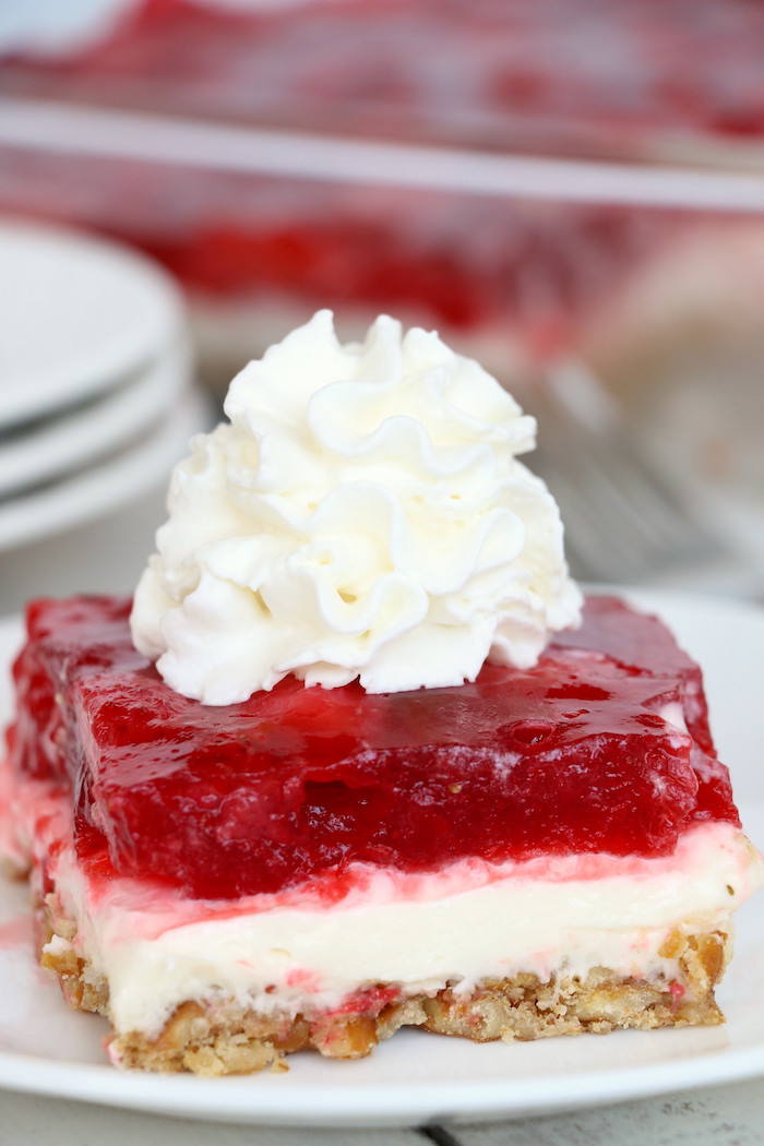 Strawberry Pretzel Dessert - This classic, potluck favorite features a crunchy pretzel crust topped with sweet cream and an irresistible strawberry jello topping. It's the perfect combination of sweet and salty!