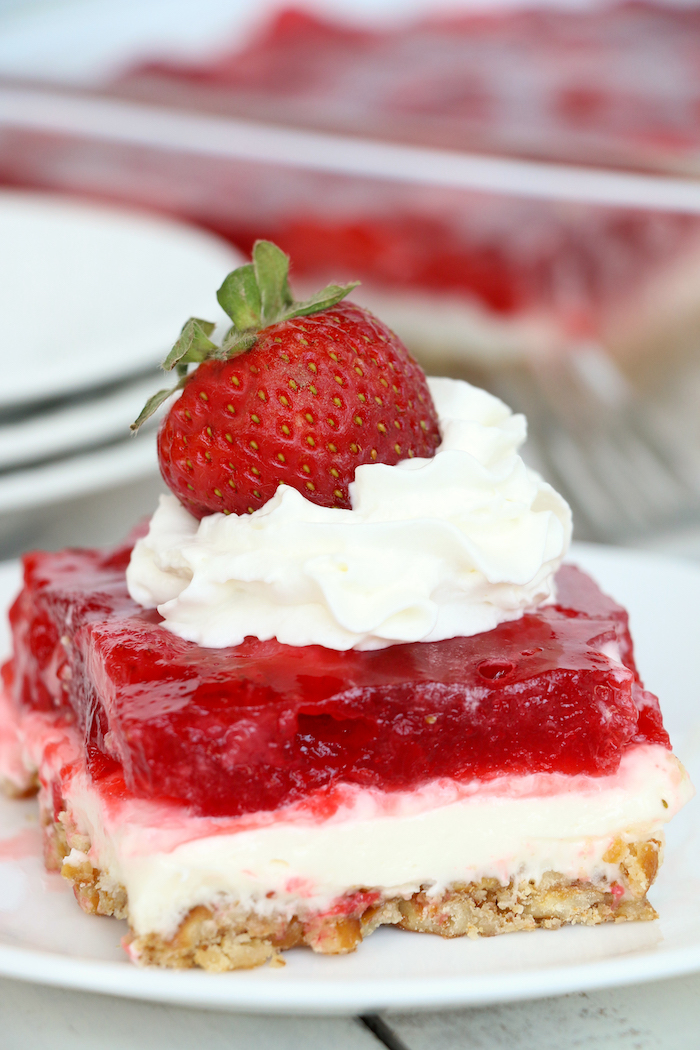 Strawberry Pretzel Dessert - This classic, potluck favorite features a crunchy pretzel crust topped with sweet cream and an irresistible strawberry jello topping. It's the perfect combination of sweet and salty!