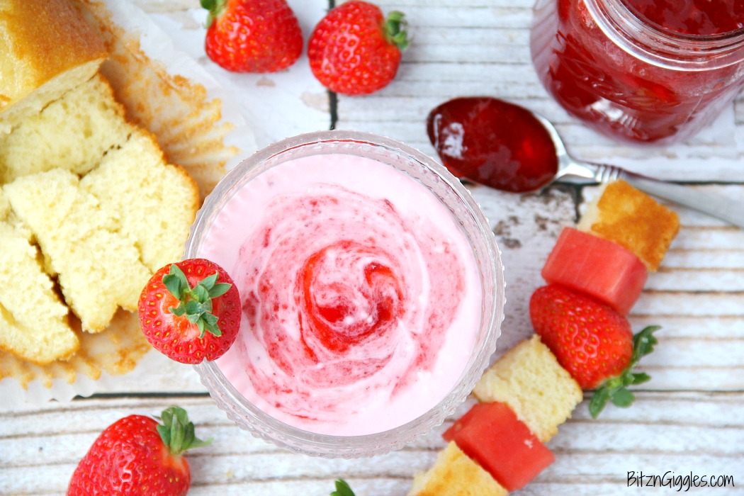 Strawberry Shortcake Dip - This dip comes together in minutes! Swirl in your favorite strawberry jam, cut up some fruit and cake and start dipping!