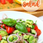 Avocado Salad - A healthy and colorful salad featuring avocado, tomato, cucumber, basil and a splash of lemon!