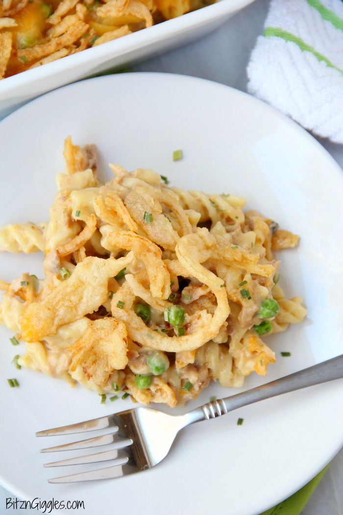 Tuna Noodle Casserole - Pasta and tuna in a creamy sauce topped with cheese and french fried onions! The perfect casserole for busy weeknights!