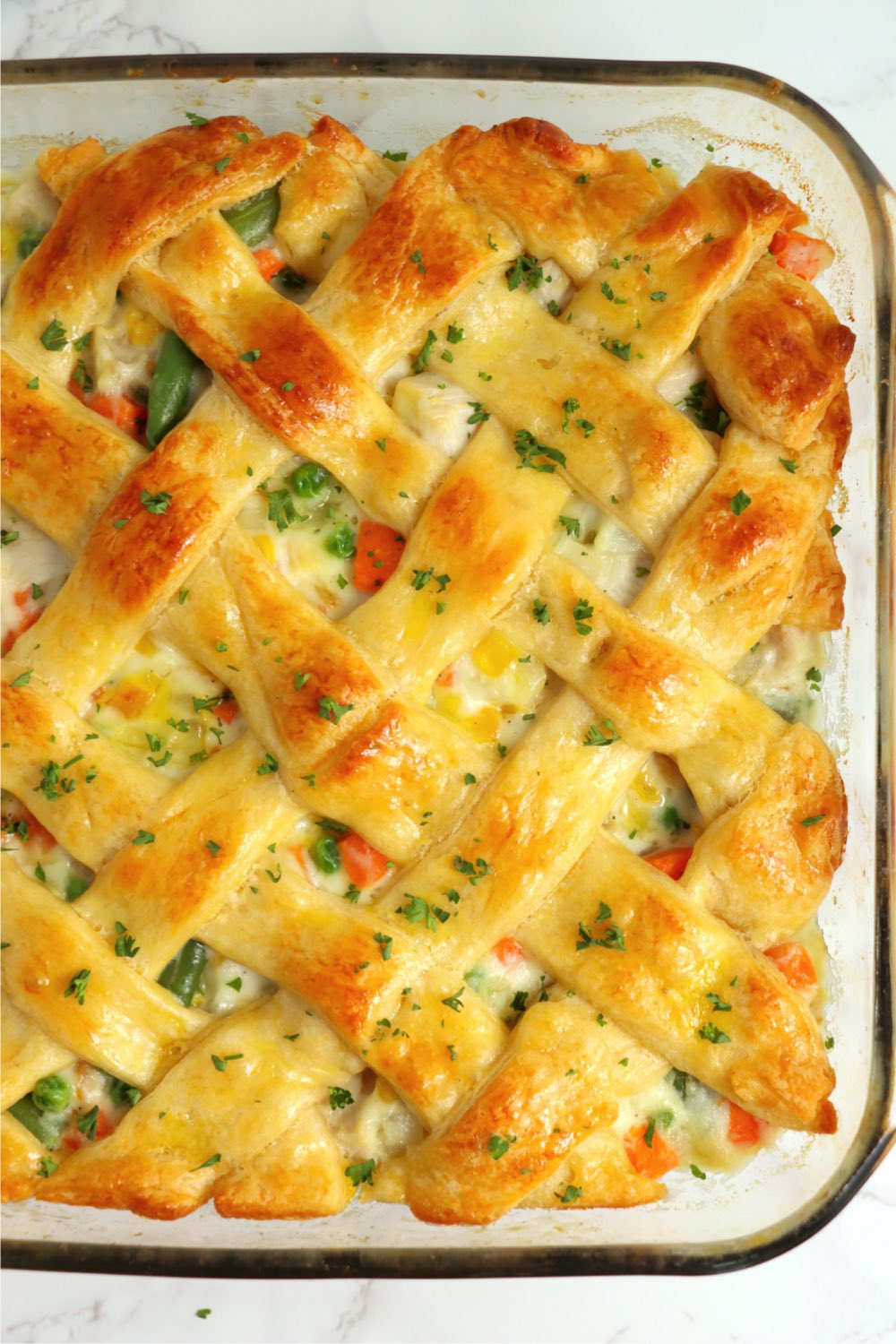 crescent roll casserole with browned lattice crust