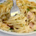 fork twirling linguine noodles