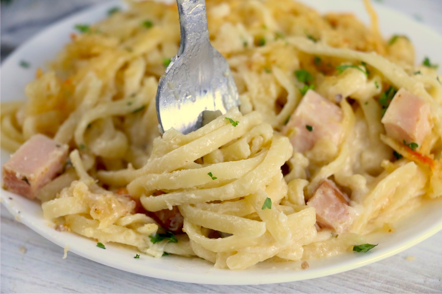 fork twirling linguine noodles