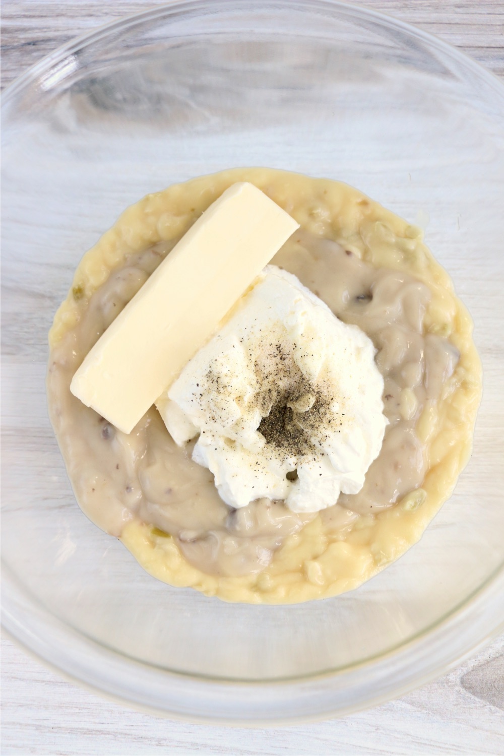 Ingredients for tetrazzini sauce in a glass bowl