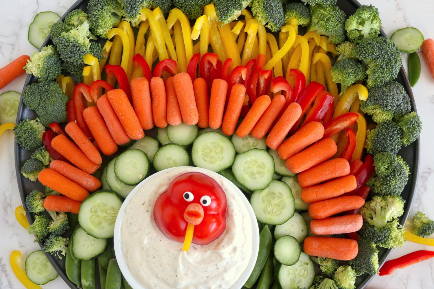 vegetables arranged in the shape of a turkey
