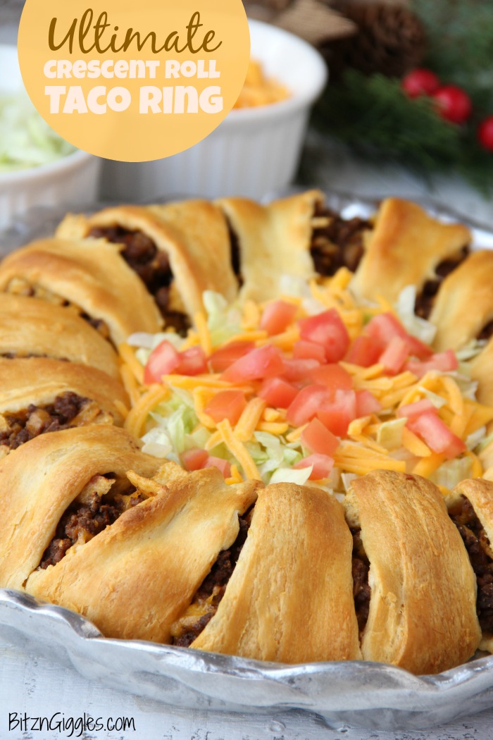 Ultimate Crescent Roll Taco Ring - This isn't just a taco ring, it's filled with guacamole, sour cream, cheese and tomatoes - easy and delicious, ready to serve a crowd!