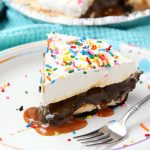 Ultimate Ice Cream Sundae Pie - Fudge and caramel topping filled ice cream pie with a fluffy whipped topping covered in sprinkles!