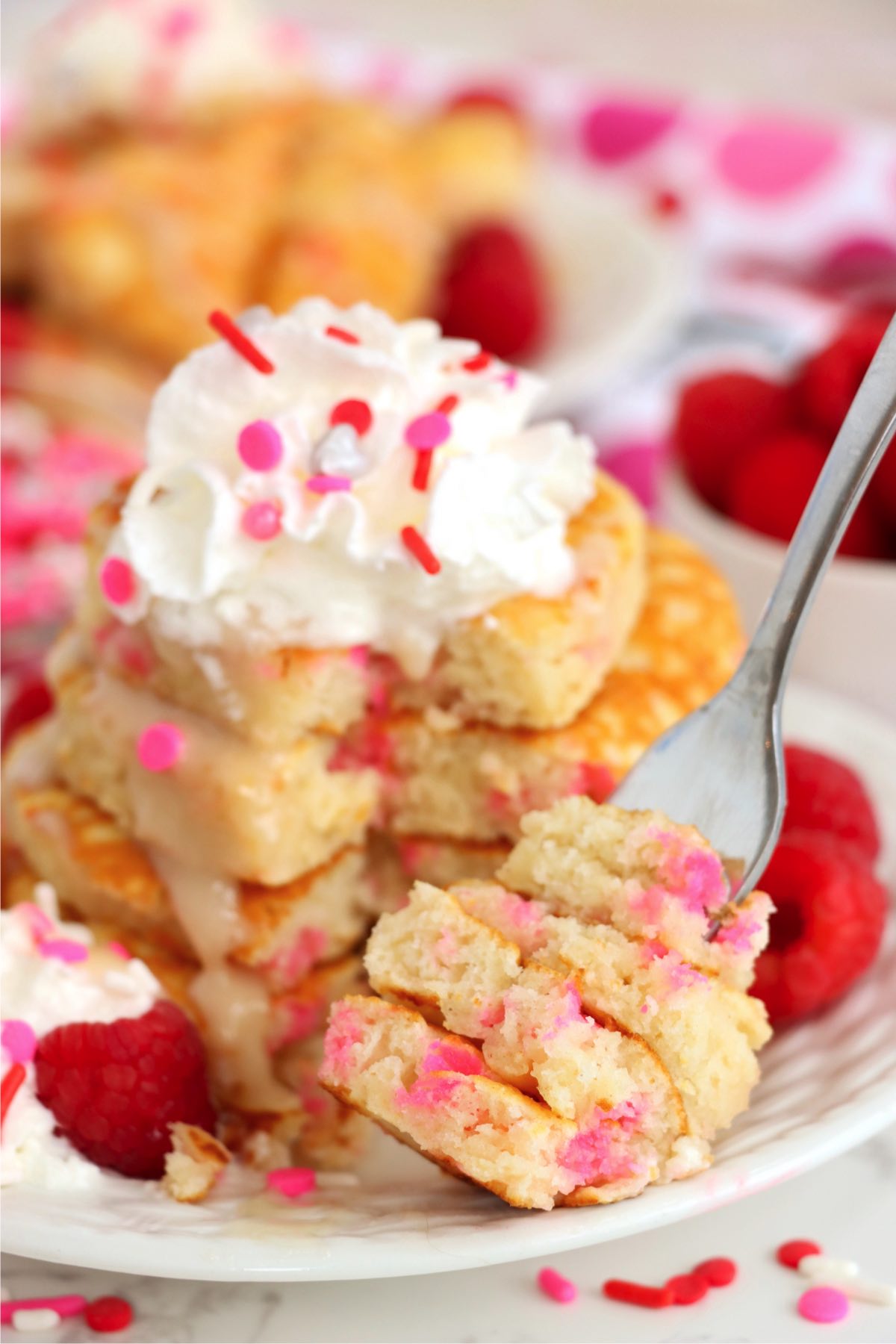 fork digging into a stack of Valentine's Day pancakes