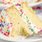 Vanilla cake with piece taken out