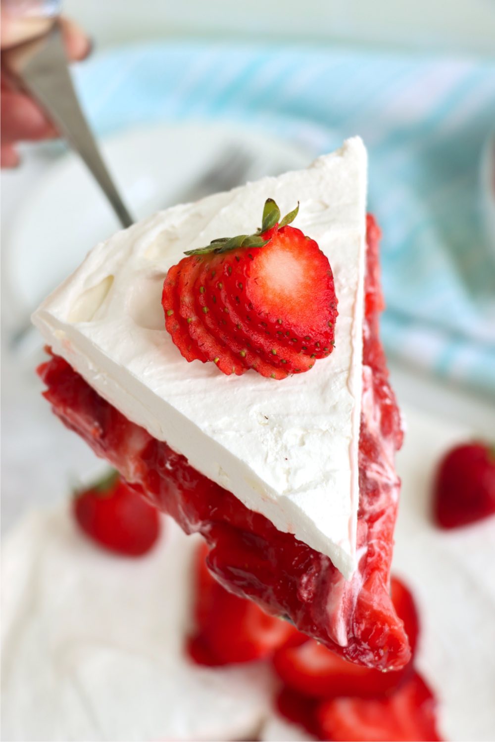 piece of strawberry pie on a server