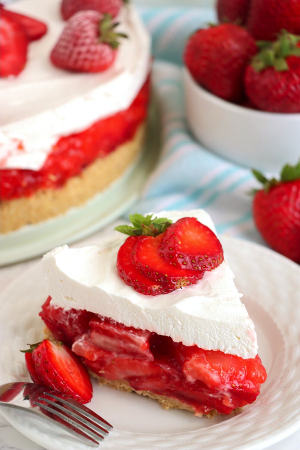 piece of pie filled with fresh strawberries